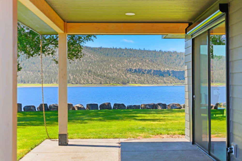 Covered porch framing reservoir view