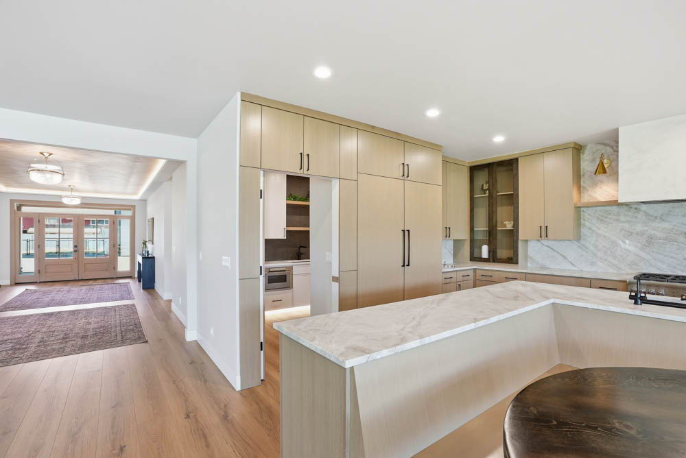 Kitchen view to entry foyer