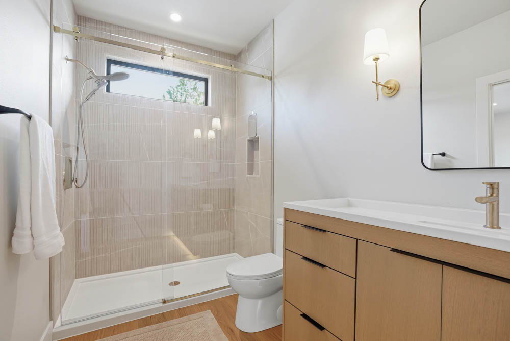 Guest bathroom gold fixtures
