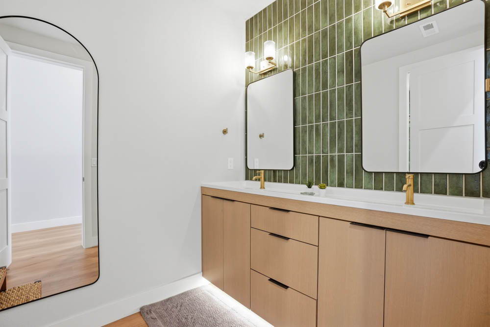 Green tile bathroom double vanity